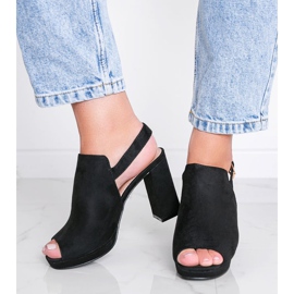 Black sandals on a Pimp post 1