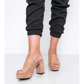 Beige sandals on a Chikie post 1