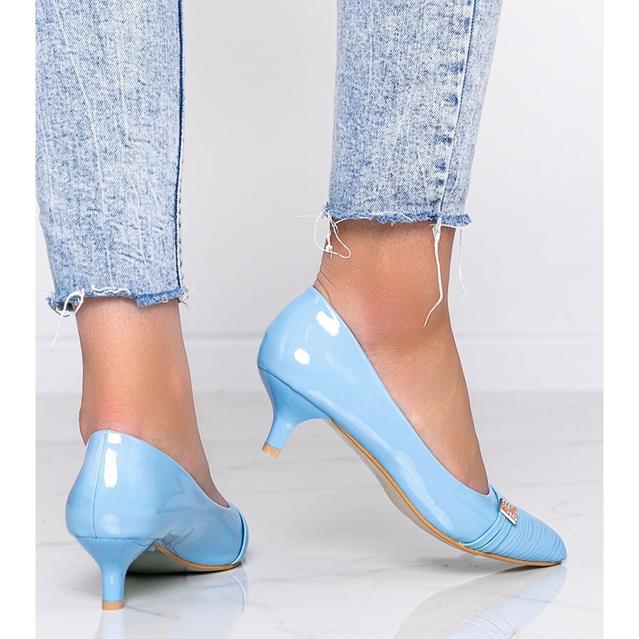 Blue pumps on Molly's heel - KeeShoes