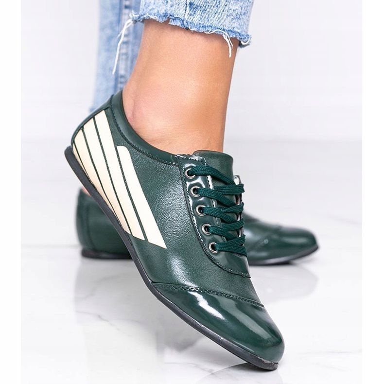 Green shoes with a varnished toe from Cheryl 1