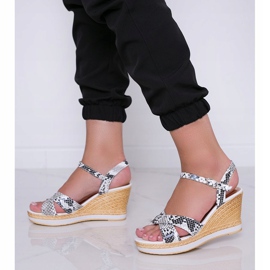 White wedge sandals in the Peekaboo snake skin pattern 1