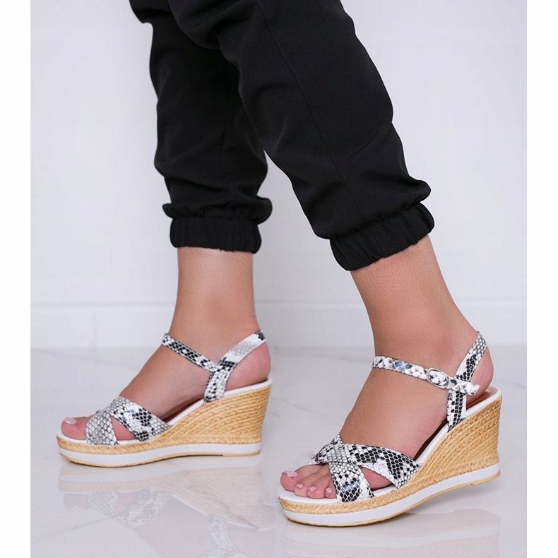 White wedge sandals in the Peekaboo snake skin pattern 1