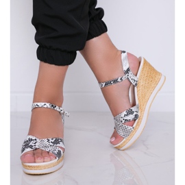 White wedge sandals in the Peekaboo snake skin pattern 2