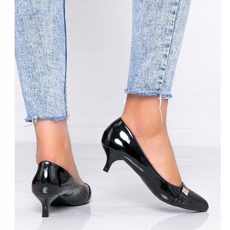 Black pumps on Molly's low heel 1
