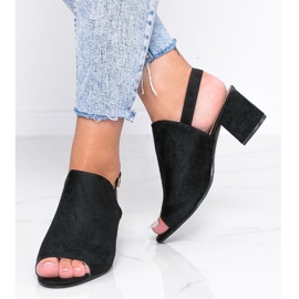 Black sandals on a post with a Blubbery upper 1