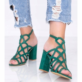 Green openwork sandals on the Imani post 1