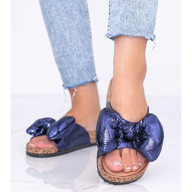 Blue slippers with a Norris bow 1