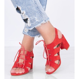 Red lace-up sandals on the post of Isabella 1