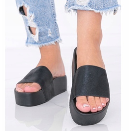 Black slippers on a thick Crysta sole 1