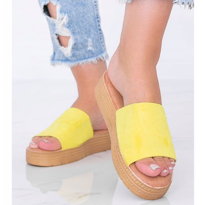 Yellow slippers on the Dr. Martin 1