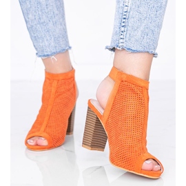 Orange openwork sandals on the Bite post 1