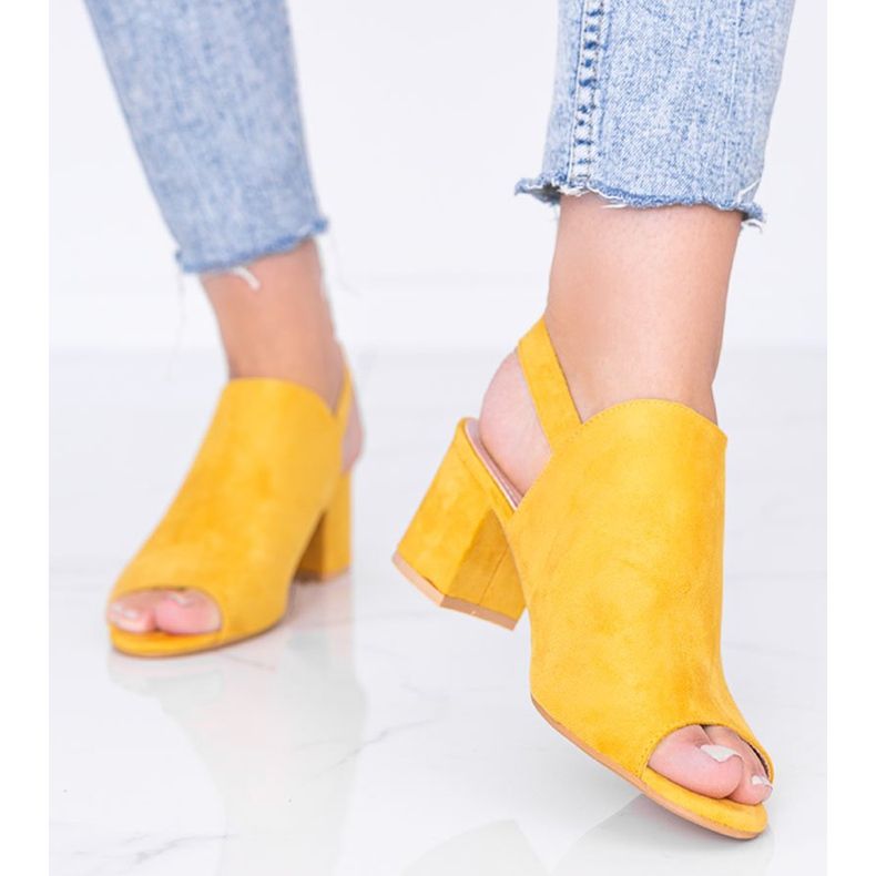 Mustard sandals on a post with a Blubbery upper yellow 1