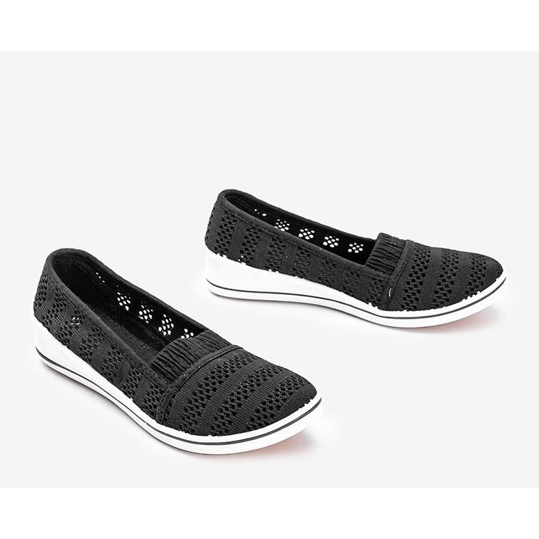 Black Slip On sneakers on the SoHo wedge 1