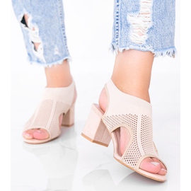 Beige sandals with an openwork Yolandi upper 1