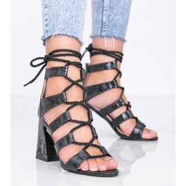 Black sandals with a Merry snake skin pattern 1