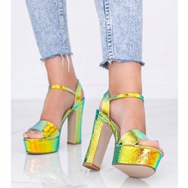Gold holographic sandals on a Diane post golden 1