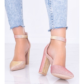 Pink shiny pumps on Mila's post golden 1