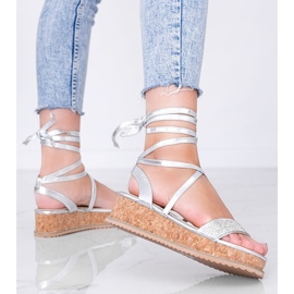 Silver sandals tied with zircons Ves 1