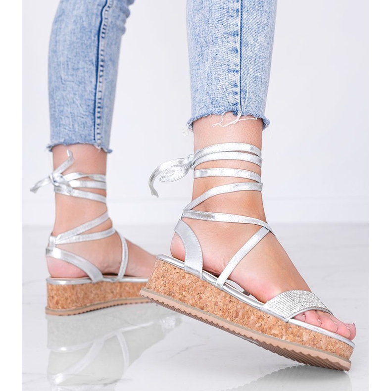 Silver sandals tied with zircons Ves 1