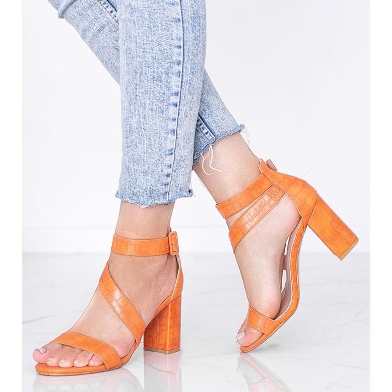 Orange sandals on the Silver Dust post 1