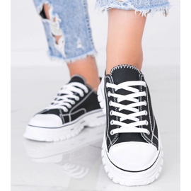 Women's black sneakers on a thick Georgia sole 1