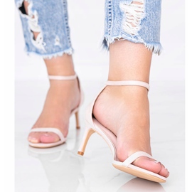 Beige sandals on a low heel by New Love 1