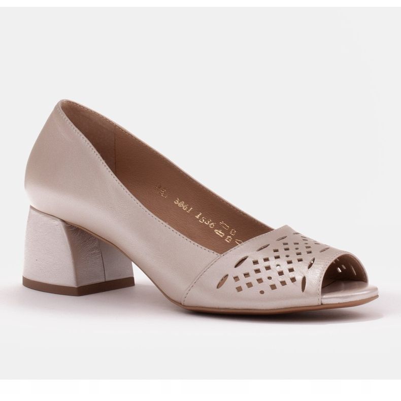 Marco Shoes Golden pumps with a decorative perforated front 1