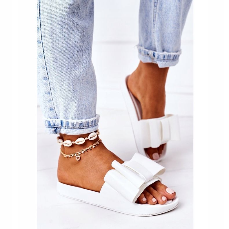 Rubber Flip Flops With A White April Bow 2