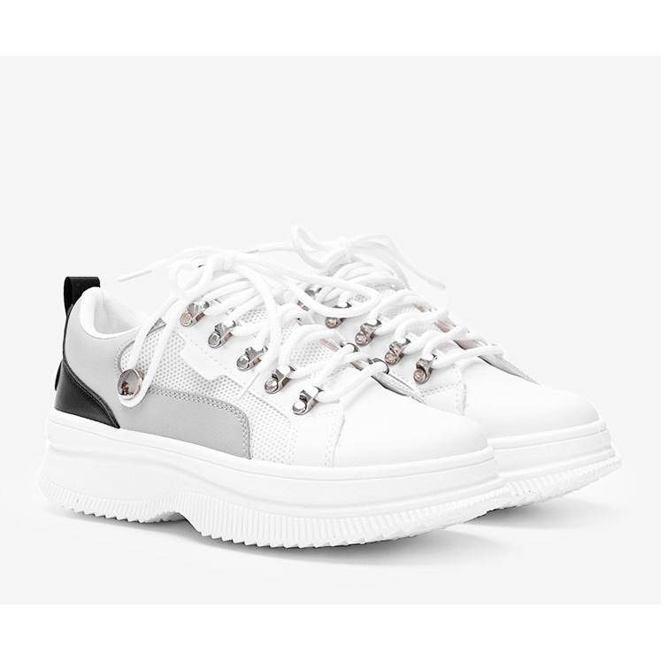 White sneakers on a high Tifel sole 1
