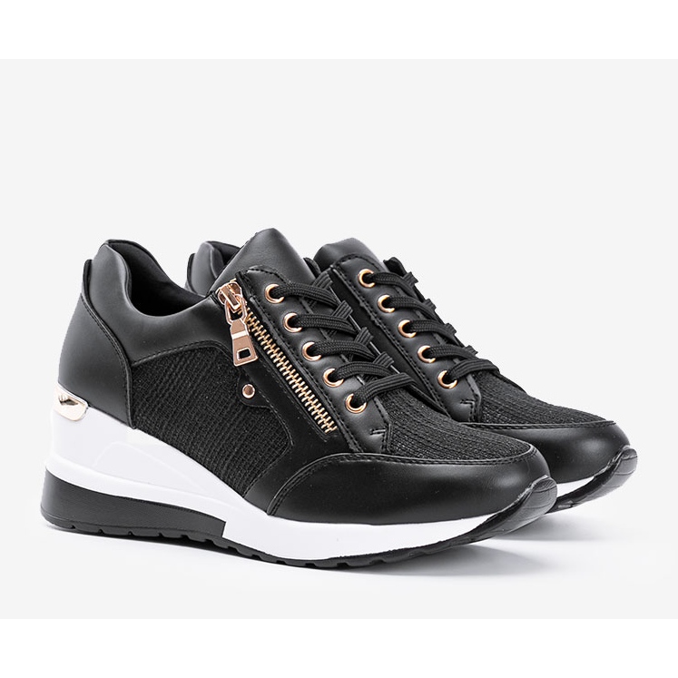 Black shiny sneakers on the wedge The Moment 1