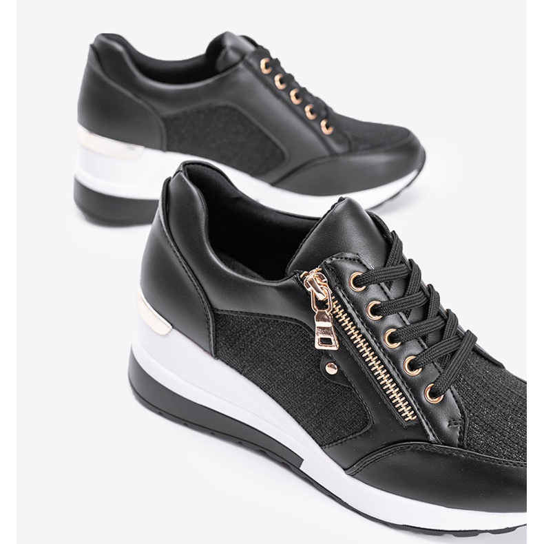 Black shiny sneakers on the wedge The Moment 2