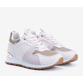 Beige sneakers with golden Yoisya accessories 1