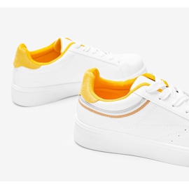 White and yellow sneakers with a thick Meia sole 1