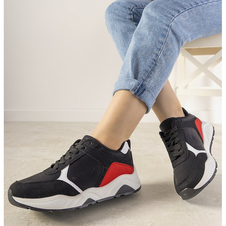 Black sneakers with red Training inserts 1