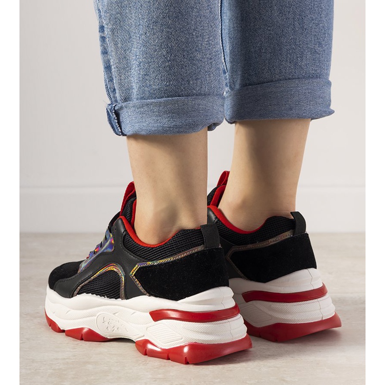 Black sneakers with holographic Freedom inserts 1