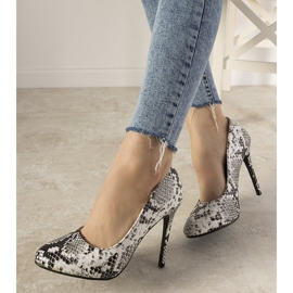 Black and white pumps in the Lasota snake skin pattern 1
