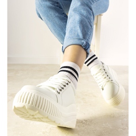 White sports sneakers with a high Under sole 1