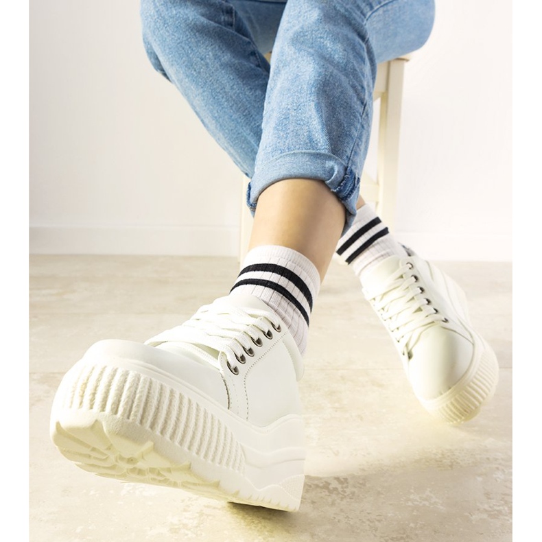 White sports sneakers with a high Under sole 1