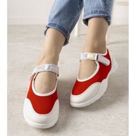Red and white trainers with a holographic Melania insert 1