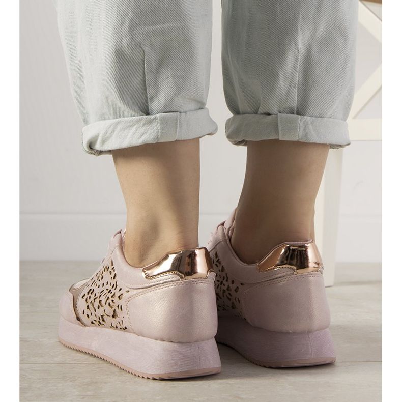 Pink sports sneakers with an openwork Festival pattern 1