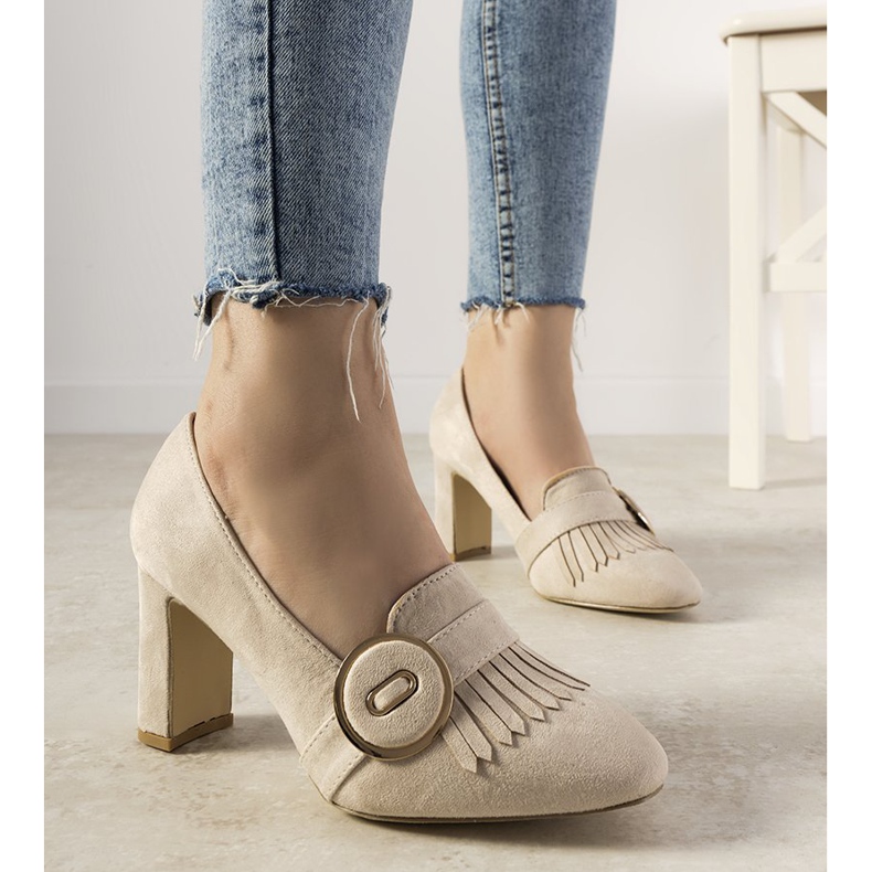 Beige pumps on a pillar with a Promise buckle 1