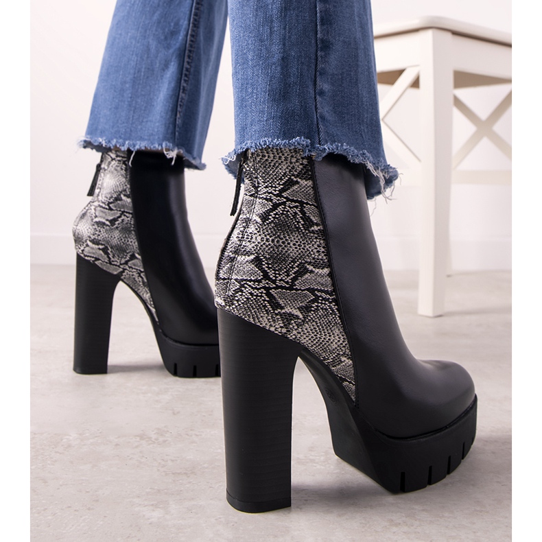 Black ankle boots in the Nudago snake skin pattern 1