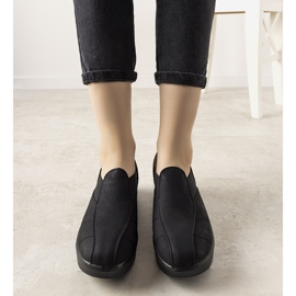 Black shoes on a high Spike sole 1