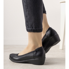 Black shoes on a thick Vontare sole 1
