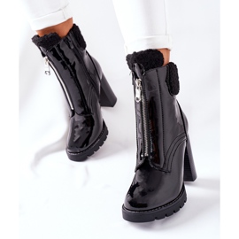 Lacquered Black Boots On A Post Arleston 2