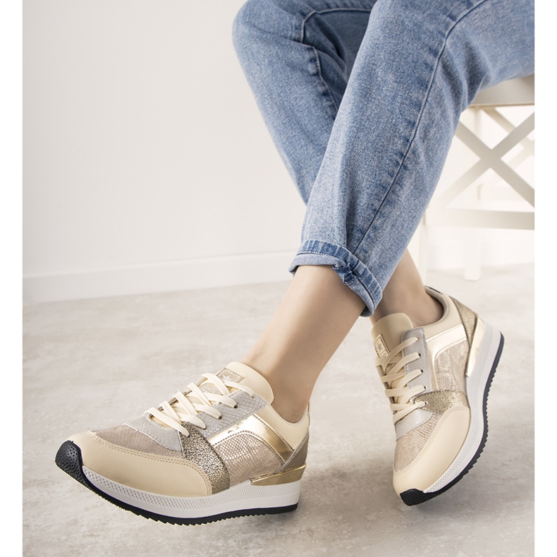 Beige sneakers with a snake skin pattern from Frances golden 1