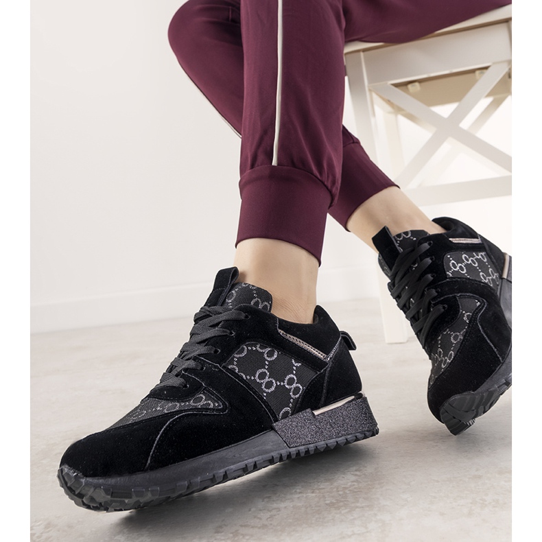 Black sneakers with metallic elements Moves 1