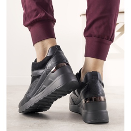 Black sneakers with a snake skin pattern from Halsey 1