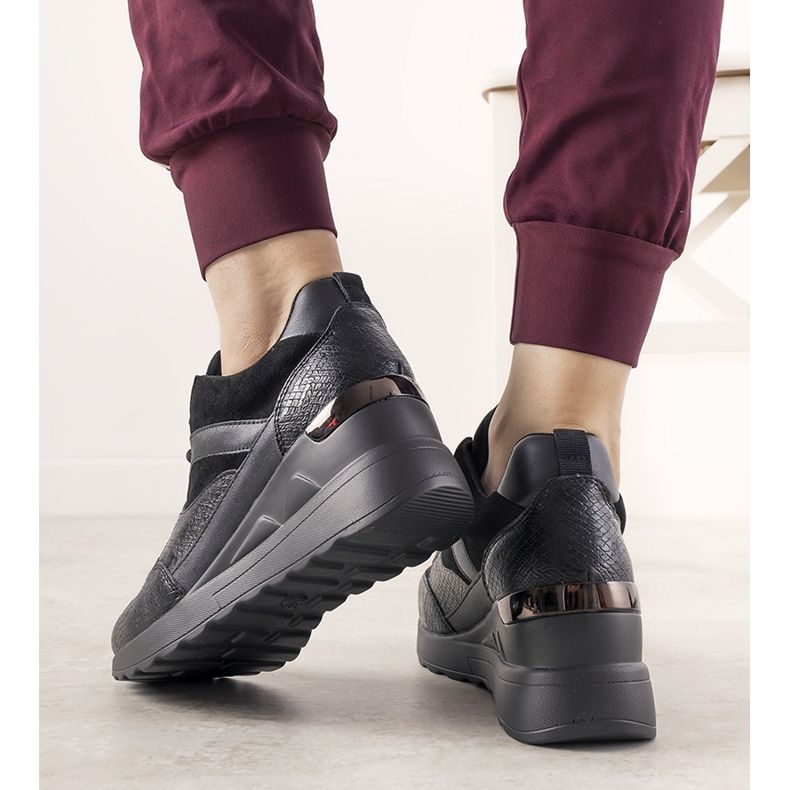 Black sneakers with a snake skin pattern from Halsey 1