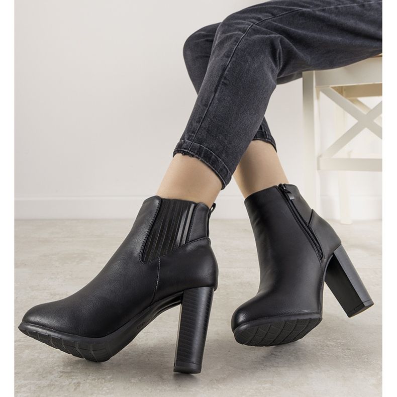 Black classic women's Castellanos boots on the post 1